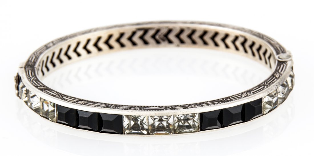 Sterling Silver Onyx and Foil Back Rhinestone Bracelet: Sterling Silver Onyx and Foil Back Rhinestone Bracelet marked Sterling. Outside D: 2.75" x 2.5" (7 x 6 cm). Weight: 22 g . Since 1937, the The Silver Shop of Princeton, NJ was located at 59 Palmer Squ