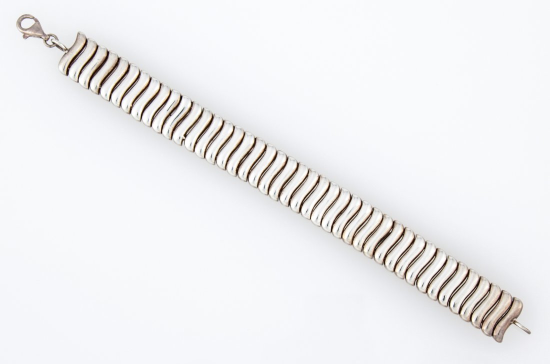 Heavy Silver Bracelet marked 925: Heavy Silver Bracelet marked 925. 8"L (20 cm). Weight: 56 g. Since 1937, the The Silver Shop of Princeton, NJ was located at 59 Palmer Square West.