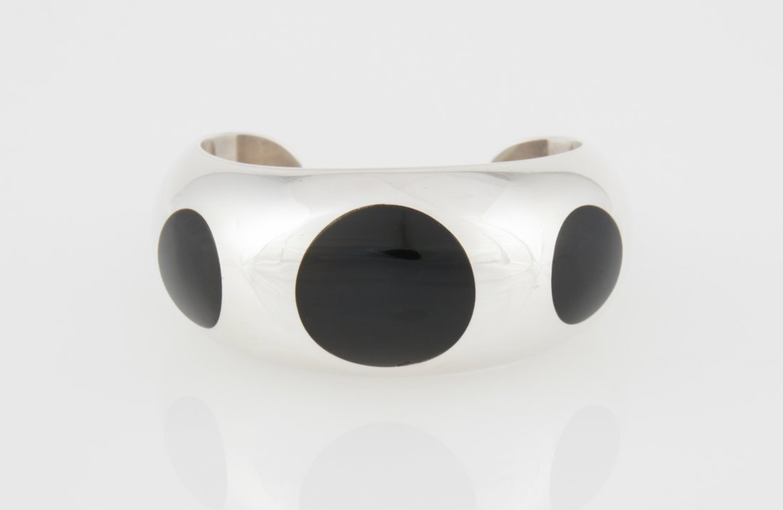 Heavy Mexican Sterling and Onyx Cuff Bracelet: Heavy Mexican Sterling and Onyx Cuff Bracelet marked 925 TC-9S AGF. 3"W x 1.25"H (8 x 3 cm). Since 1937, the The Silver Shop of Princeton, NJ was located at 59 Palmer Square West.