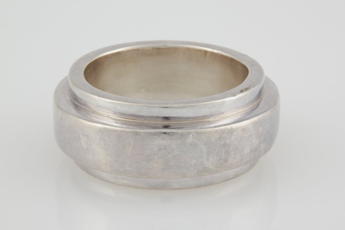 Massive Silver Bangle Bracelet: Massive Silver Bangle Bracelet etched 925. Interior 2.5"D (6 cm) Outside 3.5"D (9 cm), 1.5"H (4 cm). Weight: 112.3 g. Since 1937, the The Silver Shop of Princeton, NJ was located at 59 Palmer Square W