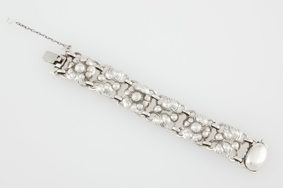 Kalo Hand Wrought Silver Bracelet: Kalo Hand Wrought Silver Bracelet marked Sterling. 7"L (18 cm) x 1"W (3 cm). Weight: 50.5 g. Since 1937, the The Silver Shop of Princeton, NJ was located at 59 Palmer Square West.