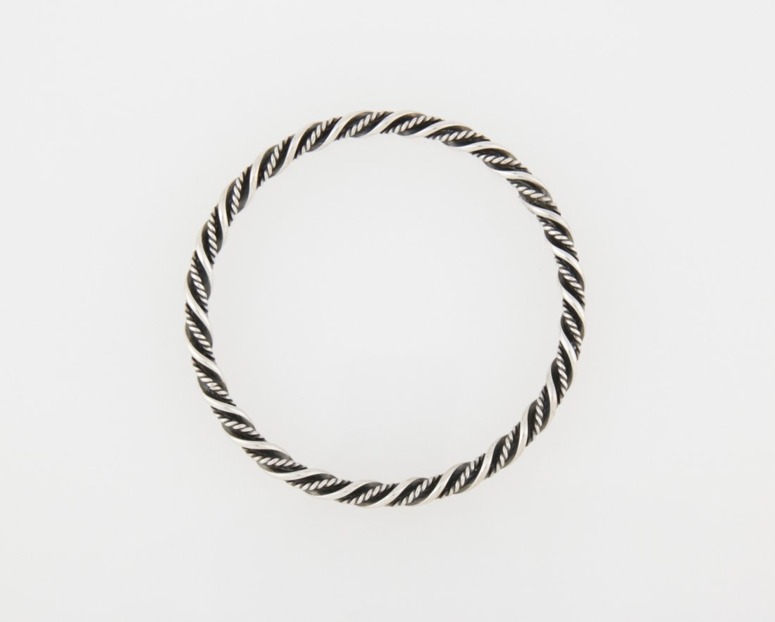 Jensen Silver Bangle Bracelet: Jensen Silver Bangle Bracelet marked Sterling Denmark. 2.5"D (6.5 cm). Weight: 19.9 g. Since 1937, the The Silver Shop of Princeton, NJ was located at 59 Palmer Square West.