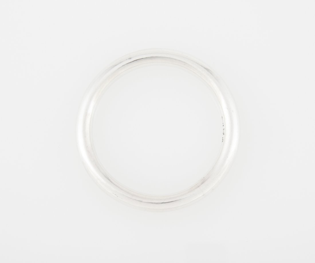 Sterling Silver Bangle Bracelet: Sterling Silver Bangle Bracelet marked 925 TC-16. 3.25"D (8 cm). Weight: 36 g. Since 1937, the The Silver Shop of Princeton, NJ was located at 59 Palmer Square West.