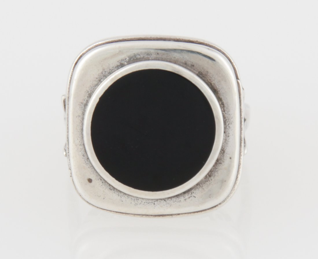 Sterling Silver and Onyx Ring: Sterling Silver and Onyx Ring marked 925. Size: 5. Weight: 4.6 g. Since 1937, the The Silver Shop of Princeton, NJ was located at 59 Palmer Square West.