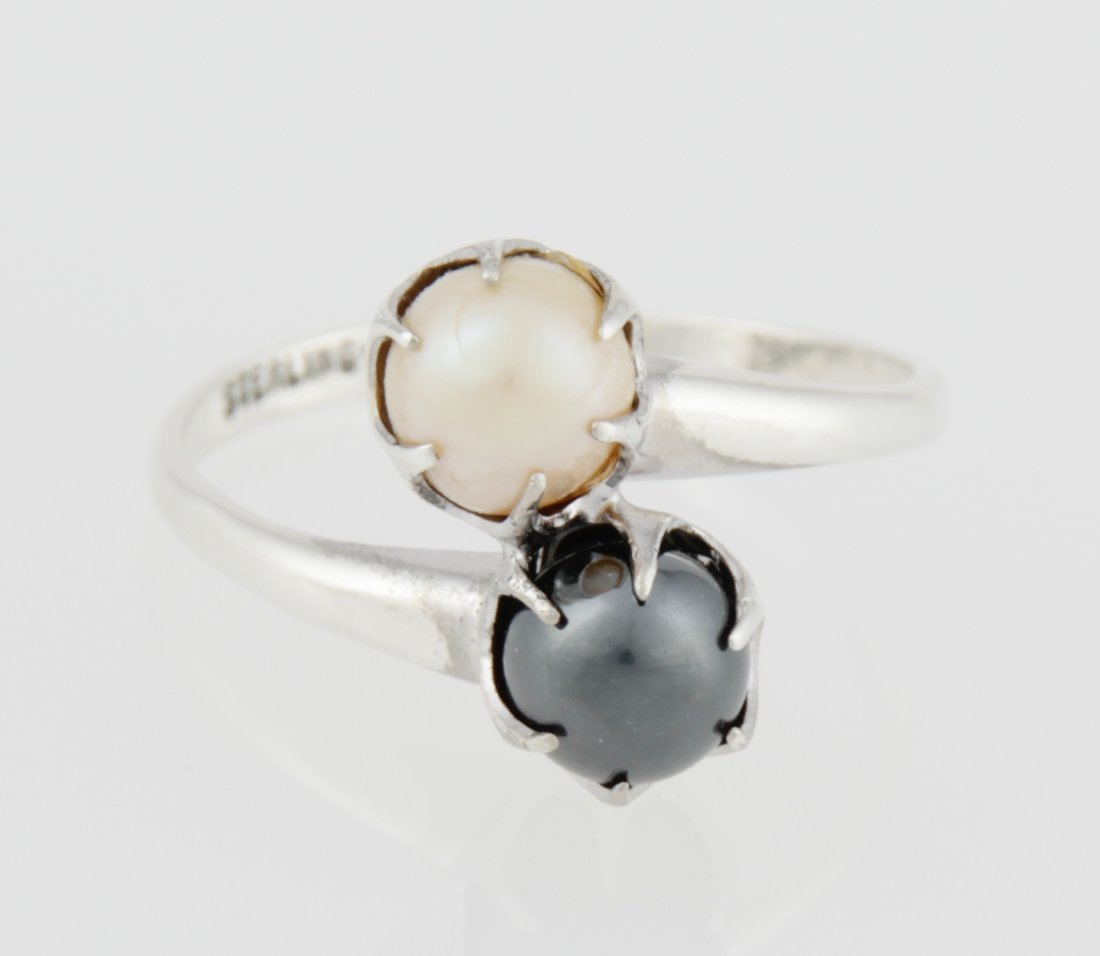 Silver and Pearl Ring: Silver and Pearl Ring marked Sterling-ESPO. Size: 7. Weight: 2.6 g. Since 1937, the The Silver Shop of Princeton, NJ was located at 59 Palmer Square West.