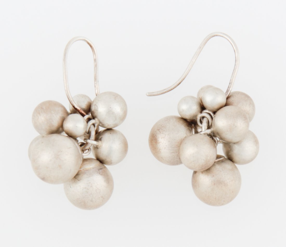 Burnished Sterling Silver Drop Earrings: Burnished Sterling Silver Drop Earrings. .75" (2 cm). Weight: 8.2 g (total). Since 1937, the The Silver Shop of Princeton, NJ was located at 59 Palmer Square West.