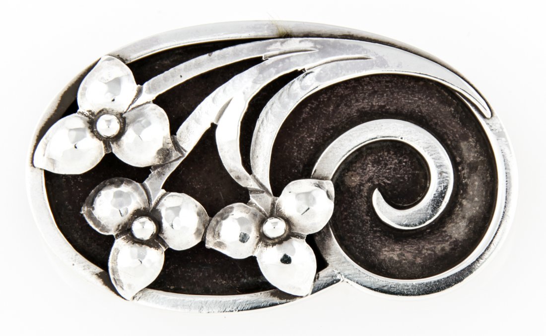 Georg Jensen USA Handwrought Silver marked Sterling 204: Georg Jensen USA Handwrought Silver marked Sterling 204. 1.25" x 1.75" (3 x 4 cm). Weight: 15.2 g. Since 1937, the The Silver Shop of Princeton, NJ was located at 59 Palmer Square West.