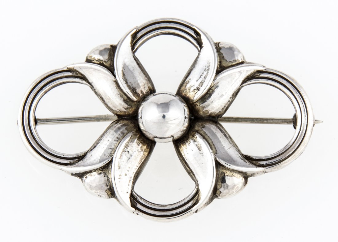 Georg Jensen Silver Brooch marked Sterling 925 S: Georg Jensen Silver Brooch marked Sterling 925 S Denmark 305. 1.75" (4 cm). Weight: 7.2 g. Since 1937, the The Silver Shop of Princeton, NJ was located at 59 Palmer Square West.