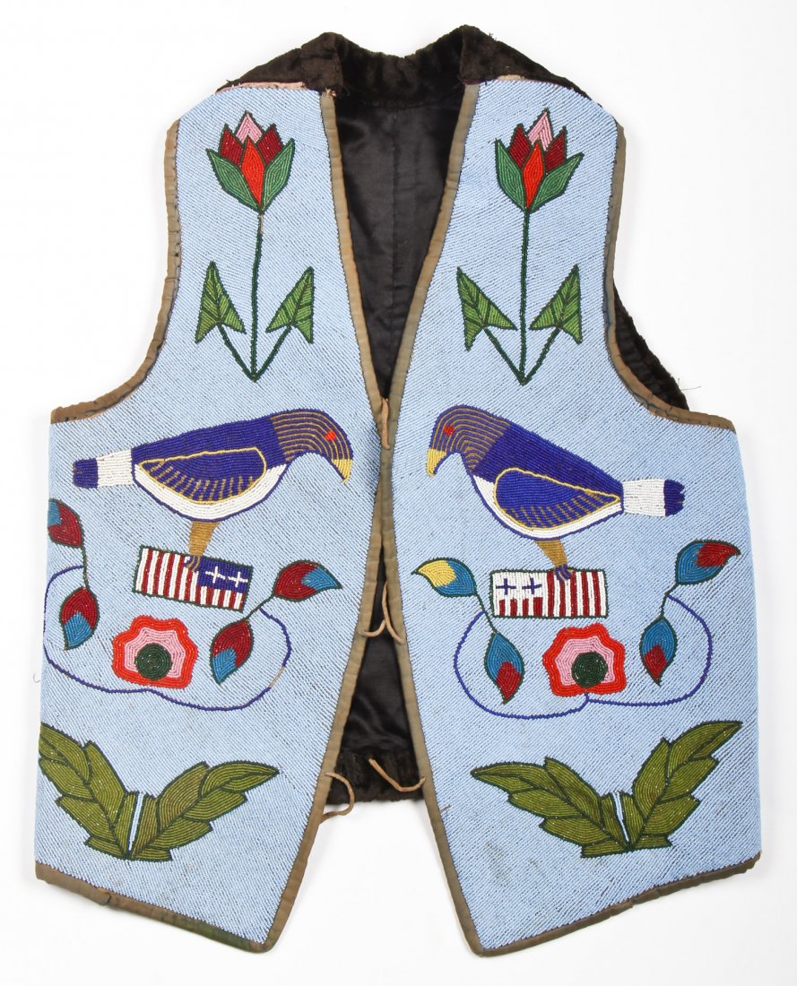 Plains Beaded Vest: Plains Beaded Vest, early 20th c. Glass beads throughout front, fine cotton backing; dark velvet back. Length: approx 24 inches. Pictured in an early photo of Joe Grimm's collection. Provenance: Josep