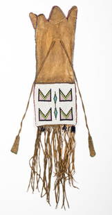 Chief Two Guns White Calf's Plains Beaded Tobacco Pouch: Chief Two Guns White Calf's Plains Beaded Tobacco Pouch. Size: 34" x 7" (86 x 18 cm). Provenance: Joseph Grimm, by descent to current owner Robert Panchison.