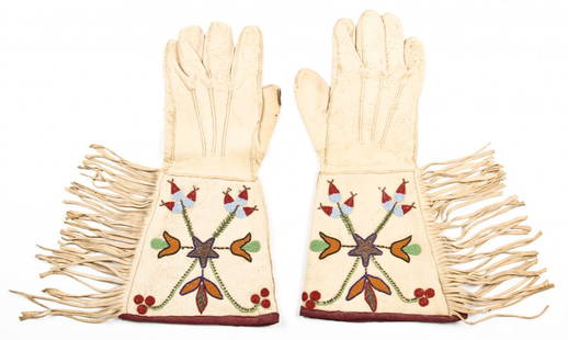 Plains Beaded Gauntlet Gloves 1890-1920's: Plains Beaded Gauntlet Gloves 1890-1920's. Leather, glass beads. Size: 15" x 8" (38 x 20 cm). Length: approx. 15 inches. Width: approx. 8 inches at arm. Provenance: Joseph Grimm, by descent to