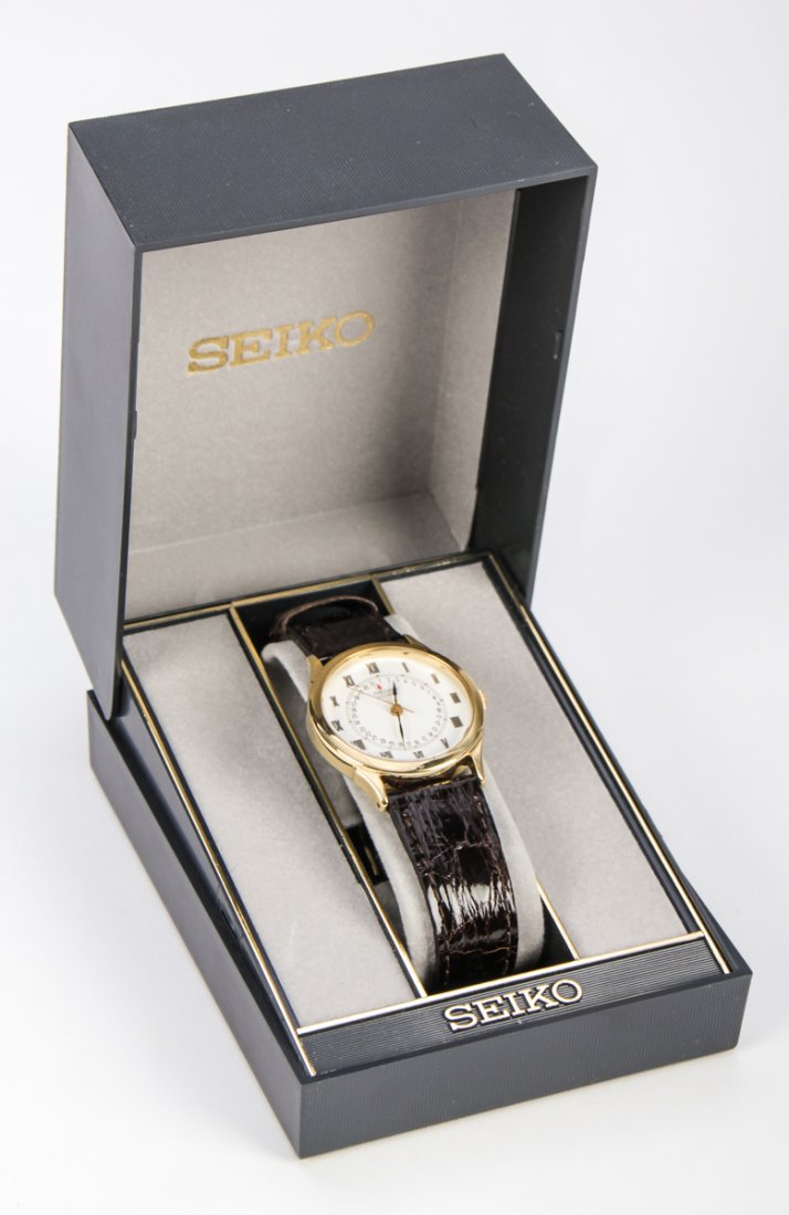 Seiko Analog Calendar Quartz Watch: Seiko Analog Calendar Quartz Watch. New in the box. Purchased in Sydney, Australia at Duty Free Shop in 1988. Size: Face is 1.25" in diameter (3 cm)