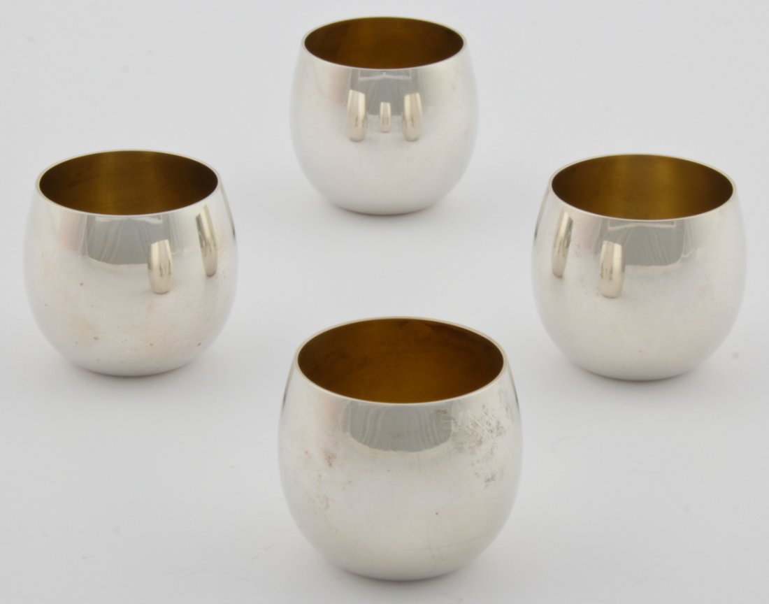 Tiffany Silver Shot Cups: Tiffany Silver Shot Cups. Set of 4 marked Tiffany & Co Sterling 25005. Size: 1.50" x 1.25", 4 x 3 cm (each). 3.88 ozt (total).