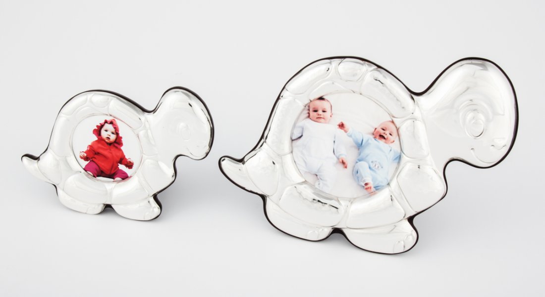 Pair of Sterling Silver and Mahogany Baby Frames: Pair of Sterling Silver and Mahogany Baby Frames, largest 5.75"H (15 cm).