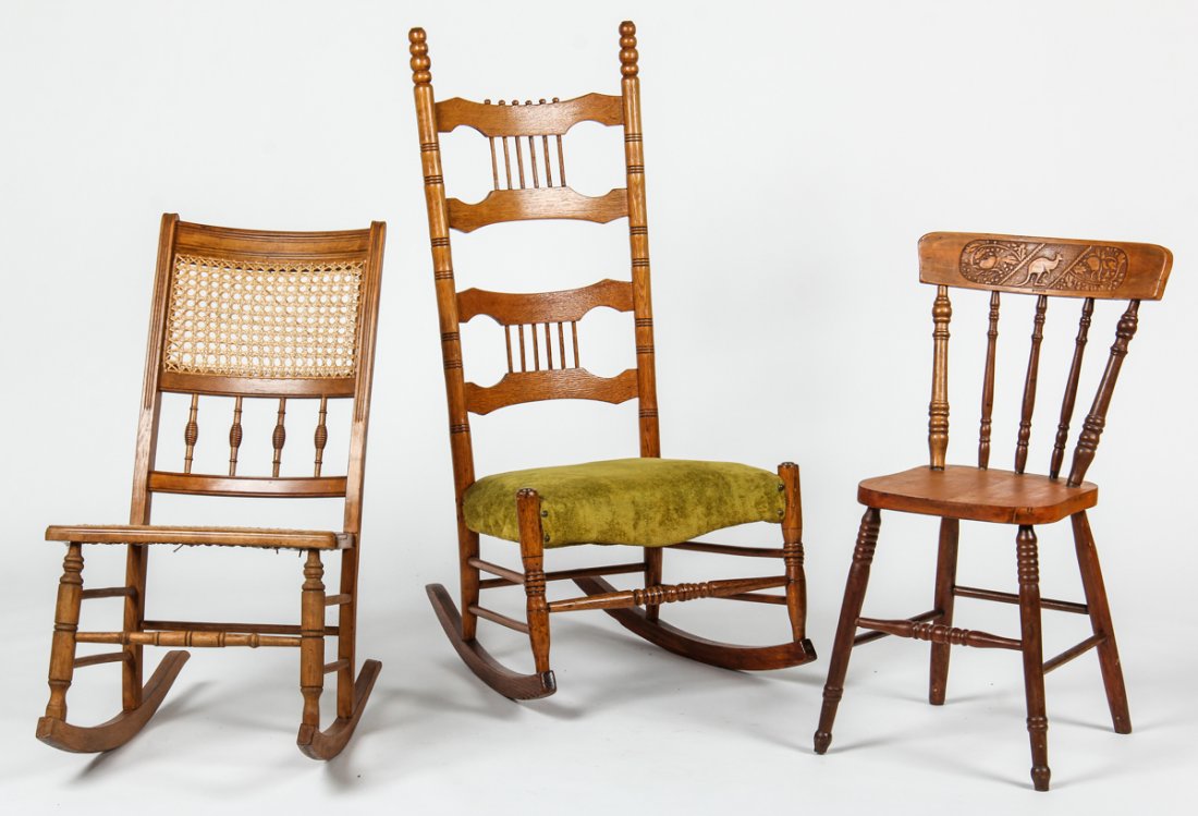 Lot of 3 Antique Chairs: Lot of 3 Antique Chairs: 2 rockers and 1 Australian Theme pressed back spindle chair. Size: 32" x 17.5" x 17" (81 x 44 x 43 cm) to 45" x 21.5" x 29" (114 x 55 x 74 cm).