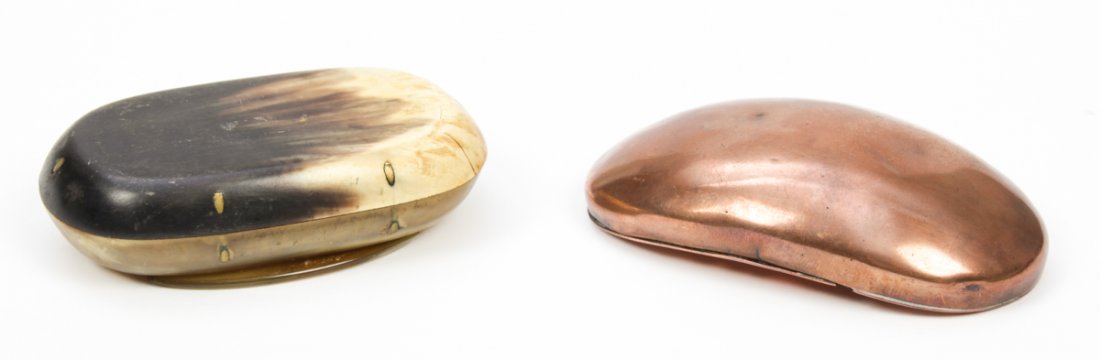Group of two 19th c. or earlier Tobacco Boxes: Group of two 19th c. or earlier Tobacco Boxes. One of copper with hinged lid that shows underside use as a strikeplate and the other made of horn and brass pins. Size: 0.75" x 3" x 2" (2 x 8 x 5 cm) e