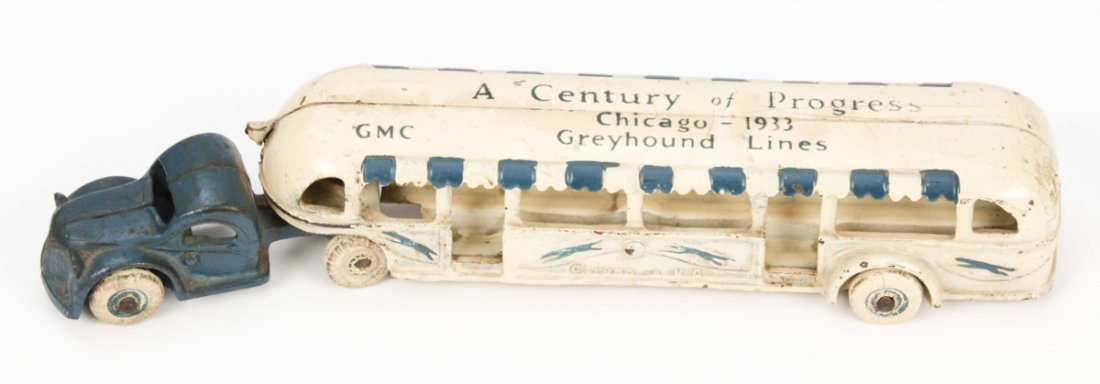 1933 Arcade Chicago World's Fair Greyhound Bus: 1933 Arcade Chicago World's Fair Greyhound Bus. Cast iron, original tires, good overall condition. Size: 1.75" x 11.5" x 3" (4 x 29 x 8 cm).