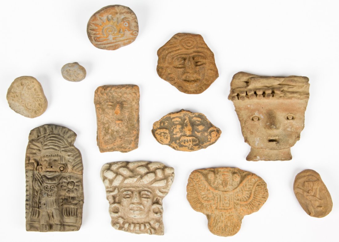 11 Pre-Columbian Earthenware Fragments: 11 Pre-Columbian earthenware fragments. Ranging in size from 0.75" x 1" x 1" (2 x 3 x 3 cm) to 4.5" x 2.5" x 1" (11 x 6 x 3 cm).