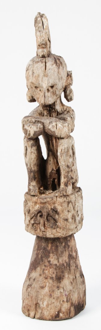 Leti Indonesian Figure: Leti Indonesian Figure, carved wood, weathering, collected in Bali c. 2010. Size: 27.5" x 5.5" x 6" (70 x 14 x 15 cm).