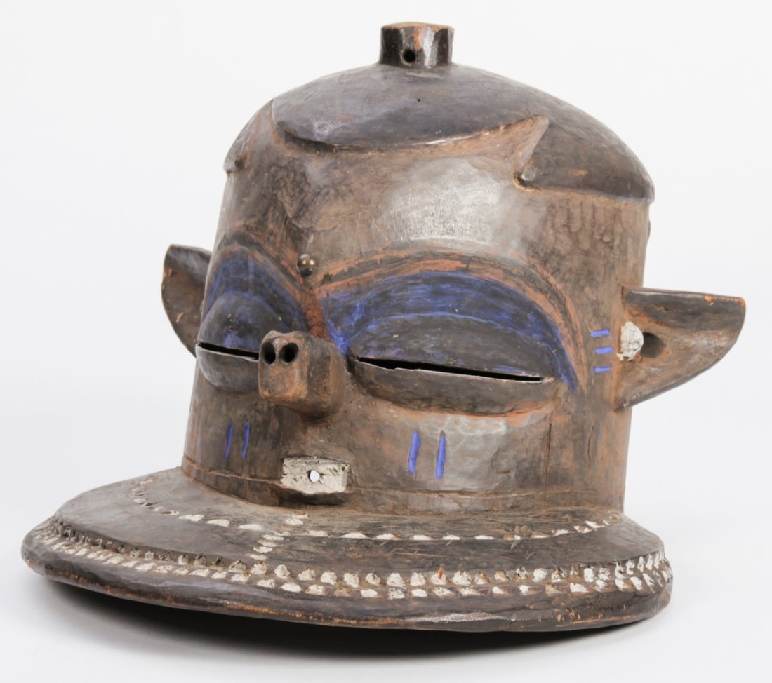 Pende "Giphogo" Mask: Pende "Giphogo" Mask, carved wood and pigment. African, mid 20th c. Size: 11" x 12.5" x 14" (28 x 32 x 36 cm).