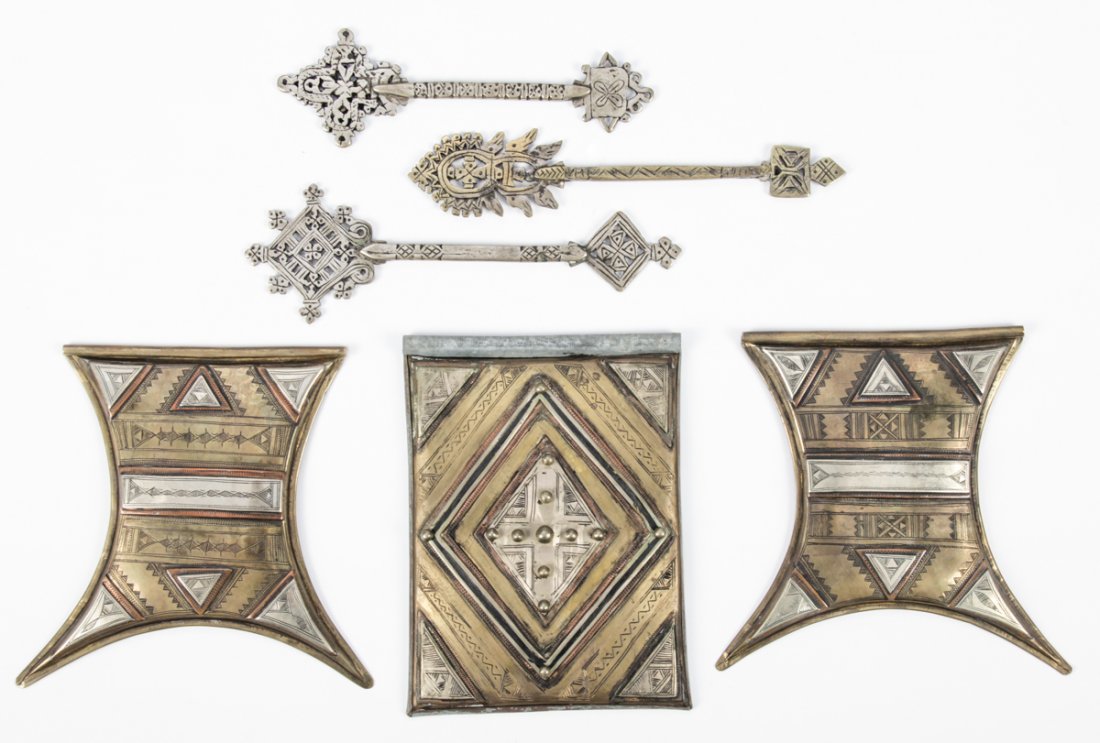Collector's Lot of 6 Middle Eastern Metal Artifacts: Collector's Lot of 6 Middle Eastern Artifacts, including 3 incised metal plaques and 3 pierced metal scepters. Sizes: 6.5" x 2" (17 x 5 cm) to 7" x 5" (18 x 13 cm).