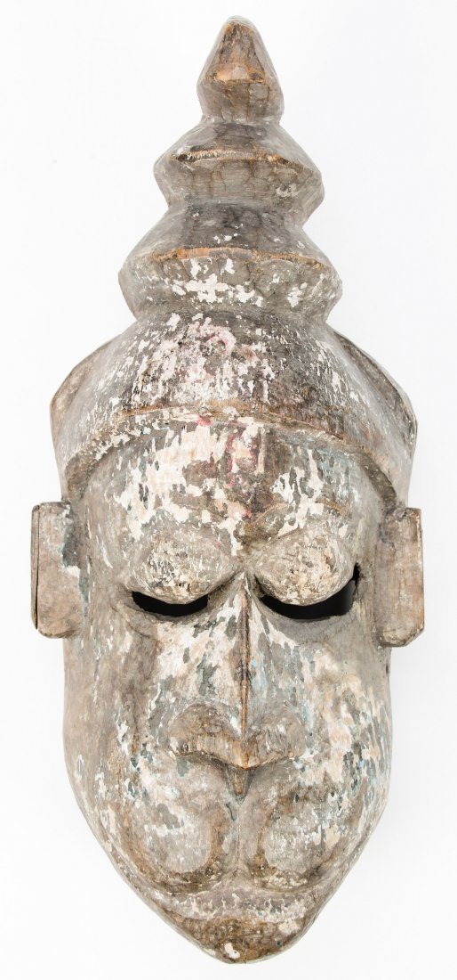 Indonesian Mask: Indonesian mask. Size: 15" x 7" x 5" (38 x 18 x 13 cm).