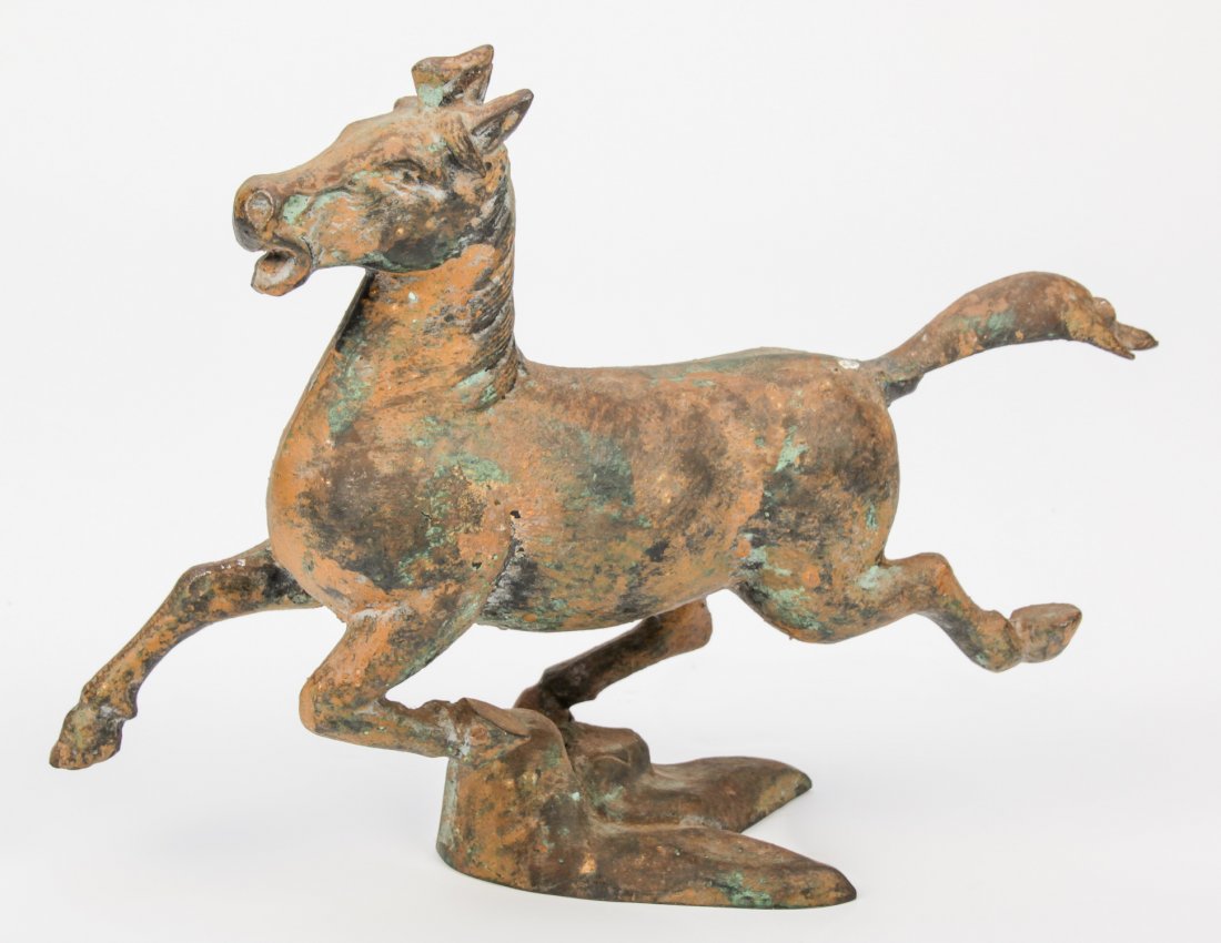 Chinese Han Dynasty Galloping Horse on Swallow: Chinese Han Dynasty Galloping Horse on Swallow Traces of gilding. Size: 9.5" x 12" x 3.5" (24 x 30 x 9 cm).