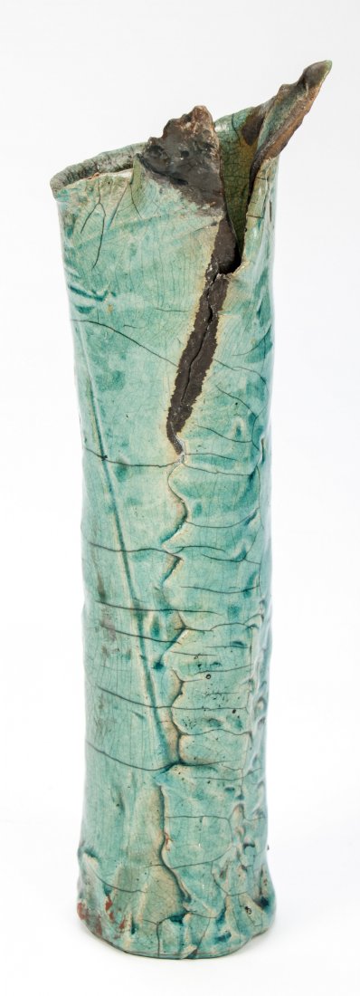 Art Pottery Vase: Art Pottery Vase. In the manner of George Ohr. Size: 12.5" x 3" x 3" (32 x 8 x 8 cm).