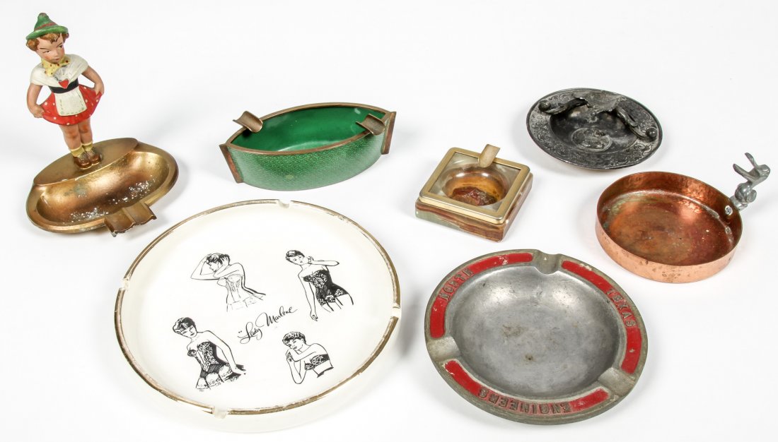 Collector's Lot of Vintage Tobacciana Accessories: Collector's Lot of Vintage Tobacciana Accessories. Consisting of 7 ashtrays in various materials including,porcelain, onyx, cloisonne, copper and bronze. Size: Largest measures 1" x 7" x 7" (3 x 18 x 