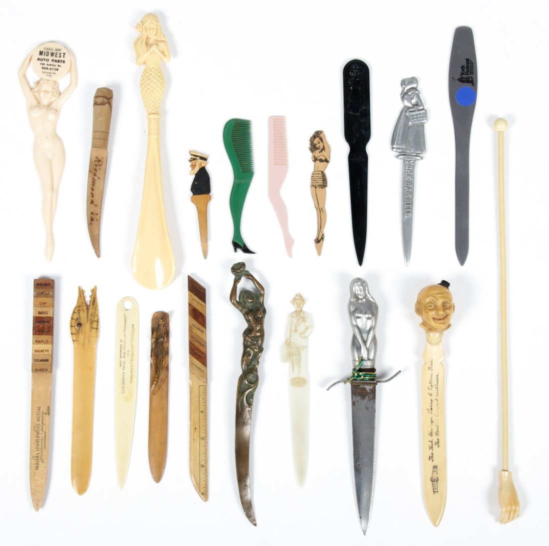 Gentleman's Collection of Accessories: Gentleman's Collection of Accessories. Consisting of promotional letter openers, combs, paperweights and scales. In various materials such as metal, bone, bakelite, and wood. Size: various.