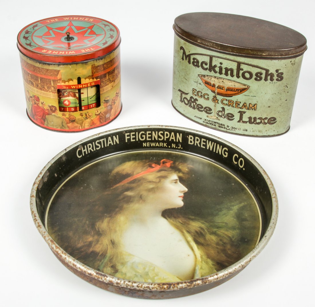 Collection of Antique Lithographed Tin: Collection of Antique Lithographed Tin. Consisting of a Feigensen beer tray, a Mackintosh's Toffee can, and a horse race biscuit tin. Size: Largest measures 2" x 13" x 13" (5 x 33 x 33 cm).