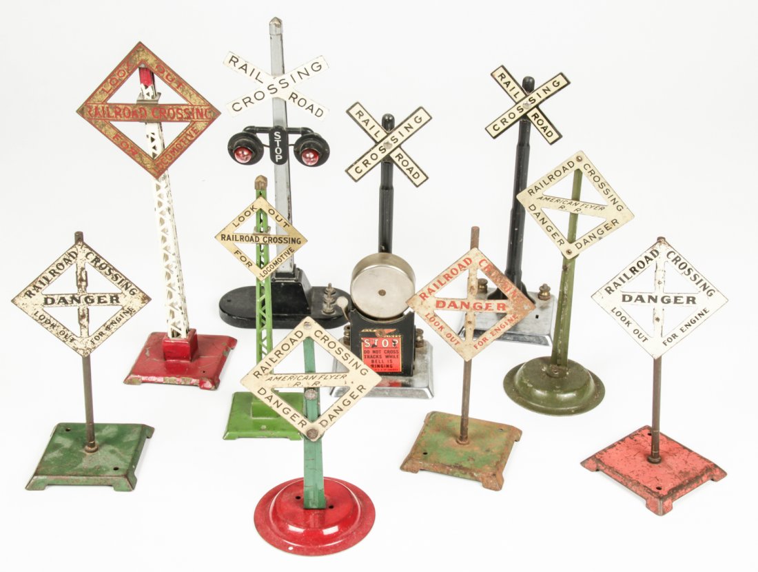 Collection of Vintage Scale Model Train Accessories: Collection of Vintage Scale Model Train Accessories. Consisting of crossing signs from Lionel and American Flyer. Size: Largest measures 9" x 2.5" x 2.5" (23 x 6 x 6 cm)
