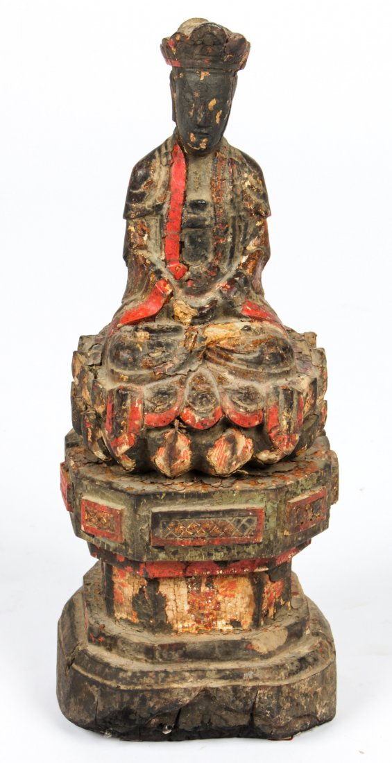 Chinese Carved Giltwood Deity, Ming Dynasty: Chinese Carved Giltwood Deity, Ming Dynasty. The figure dressed in robes and elaborate crown seated upon a lotus throne and raised on a high square-form base. Size: 15" x 5.75" x 5" (38 x 15 x 13 cm).