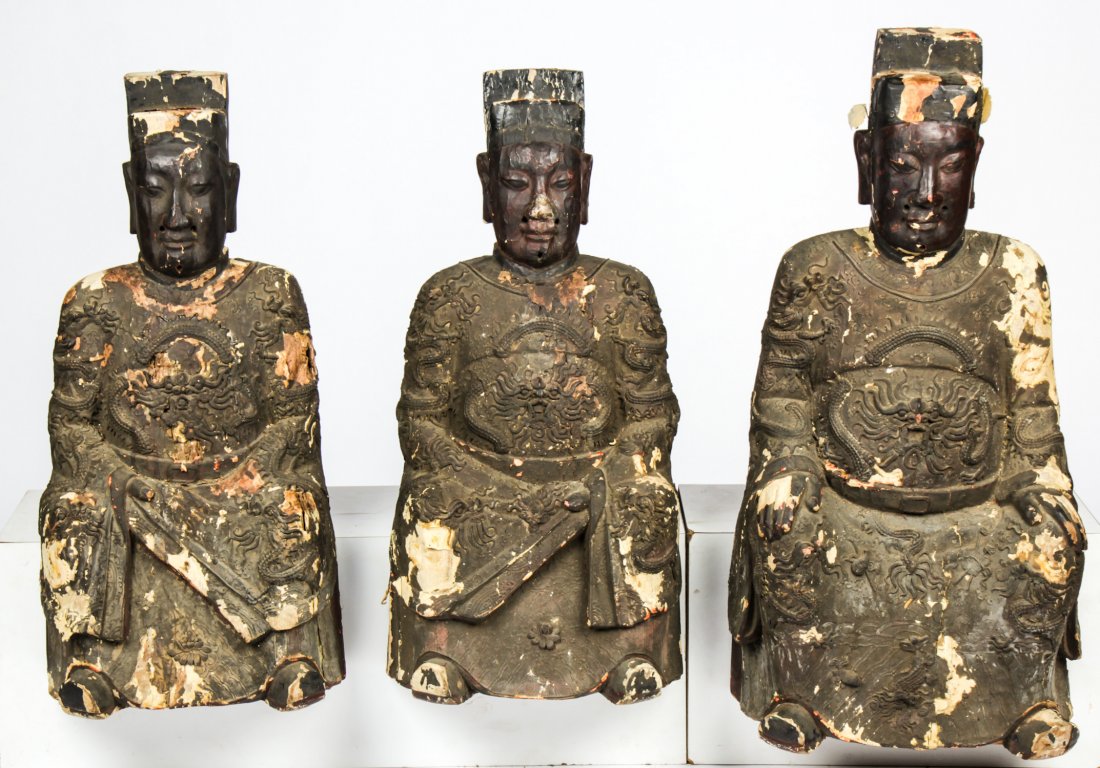 3 Chinese Lacquered Wood Seated Taoist Figures: 3 Chinese Lacquered Wood Seated Taoist Figures, Ming Dynasty. The three seated figures dressed in noble attire and applied with intricately carved lacquer and horse hair beards; perhaps representing G