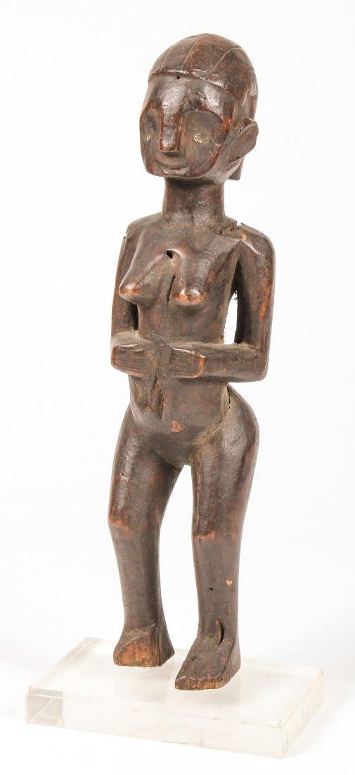 Indonesian Dayak Carved Wood Figure: Indonesian Dayak Carved Wood Figure. Size: 18" x 7" x 4" (46 x 18 x 10 cm).