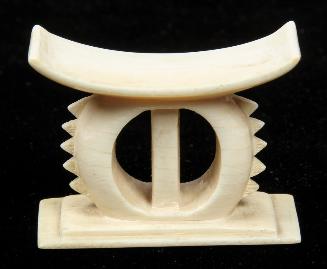 Miniature Antique Bone Ashanti Stool: Miniature Antique Bone Ashanti Stool. Size: 1.75" x 2.25" x 1.25" (4.5 x 6 x 3 cm).