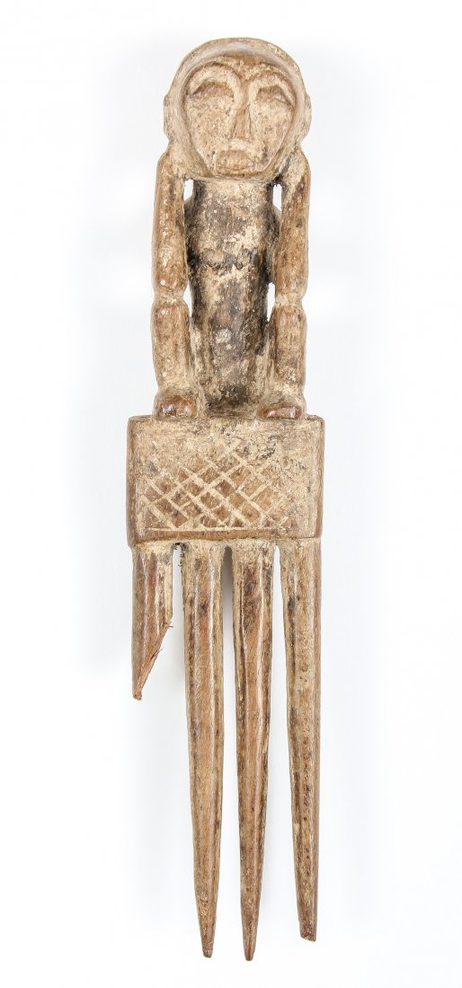 Batak Comb: Batak Comb, carved wood. Indonesia. Size: 8" x 1.75" x 1.25" (20 x 4 x 3 cm).