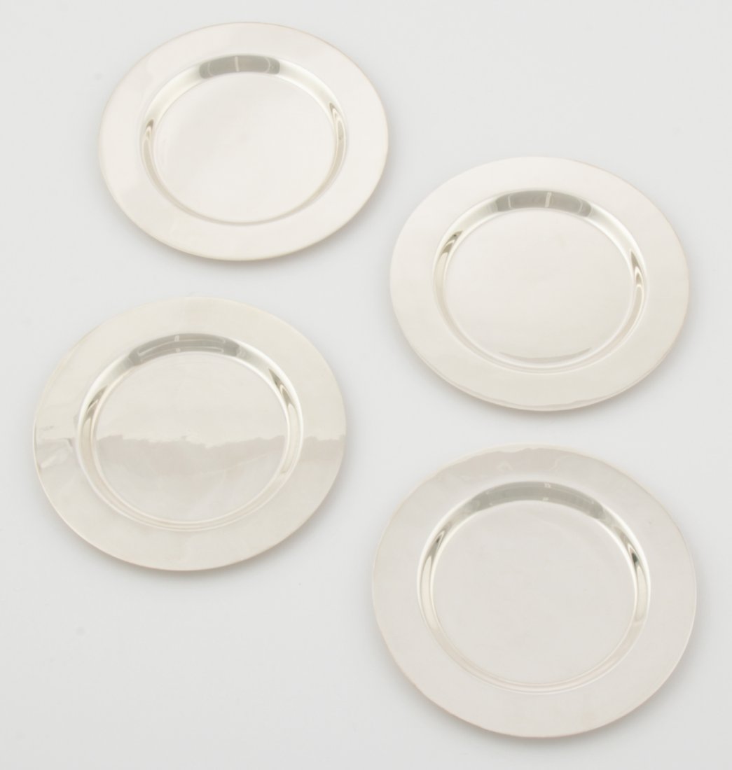 Set of Four Silver Wine Coasters: Set of Four Silver Wine Coasters. Thick, Heavy and Well-made. 6"D (15 cm). Total weight: 19.4 ozt.
