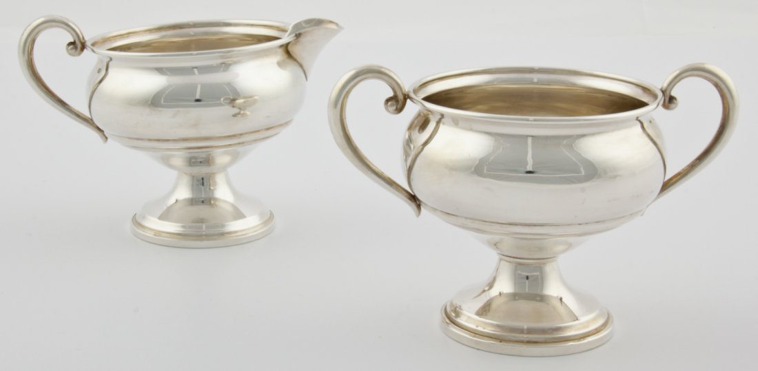 Pair of Revere Silversmiths Inc. Double Handle Footed: Pair of Revere Silversmiths Inc. Double Handle Footed Cups, marked Sterling Reinforced with Cement 1014. Size: 3.5"H, 9 cm (each).