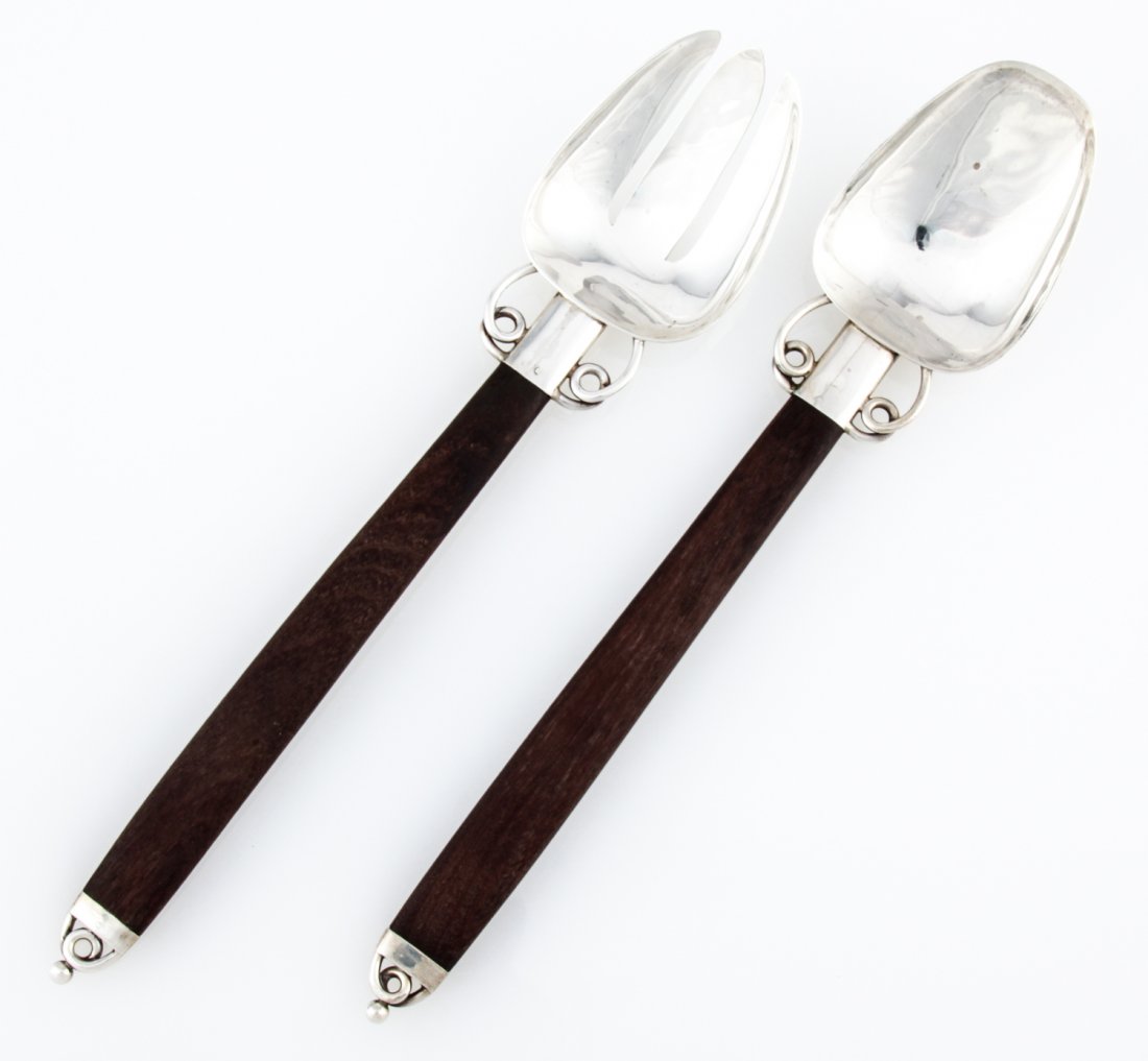 William Spratling Sterling Silver and Ebony Salad: William Spratling Sterling Silver and Ebony Salad Servers. Mexico. Handmade Serving Fork and Spoon marked Taxco 925 with Eagle Mark. 11.5"L (29 cm). Weight: 182.1 g.