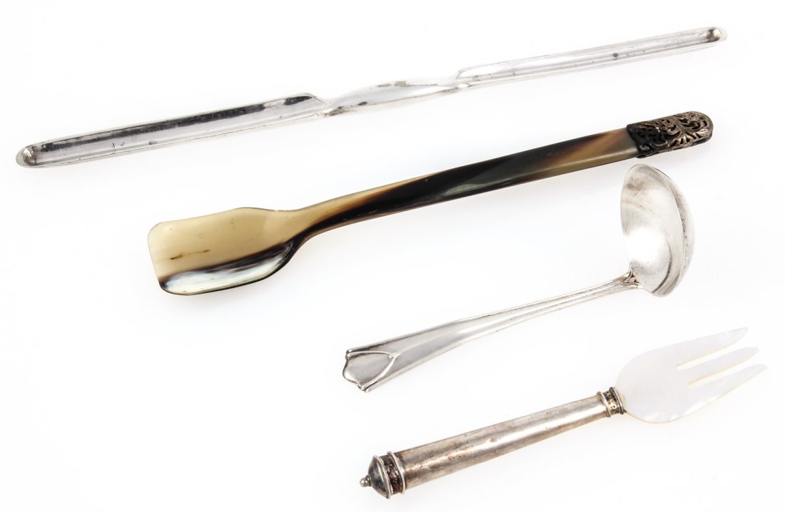 Lot of 4 silver tableware implements: Lot of 4 silver tableware implements. Cosisting of a marrow knife, a small ladle, a serving fork with nacre tines, and a molded horn spoon with reticulated finial. Size: Longest measures 9" (23 cm). P