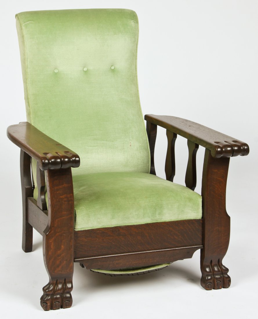 Antique Quartersawn Oak Morris Style Reclining Chair.: Antique Quartersawn Oak Morris Style Reclining Chair. With retracting footrest. Size: 38.25" x 31.5" x 31.5" (97 x 80 x 80 cm).