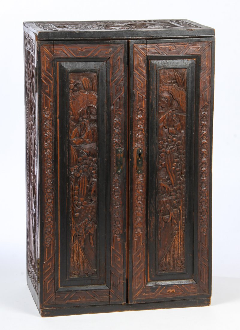 Relief Carved Chinese Motif Apothecary Chest: Relief carved Chinese motif apothecary chest. Fitted interior. Size: 29" x 18" x 11.25" (74 x 46 x 29 cm).