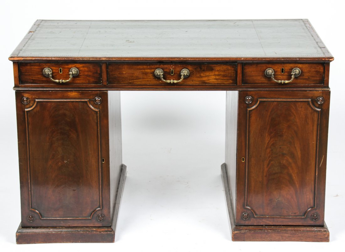 Regency Style Mahogany Partner's Desk: Regency Style Mahogany Partner's Desk. Inset Leather top. Size: 30.25" x 49" x 30.5" (77 x 124.5" x 77.5 cm). Provenance: Estate of Eileen Ford, Tewksbury, New Jersey.