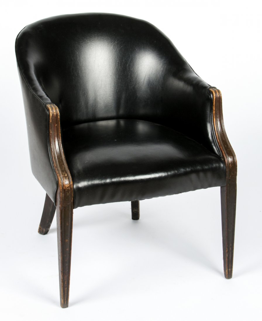 Barrel Back Leather Chair: Barrel Back Leather Chair. Size: 33" x 25.25" x 29.5" (84 x 64 x 75 cm). Provenance: Estate of Eileen Ford, Tewksbury, New Jersey.