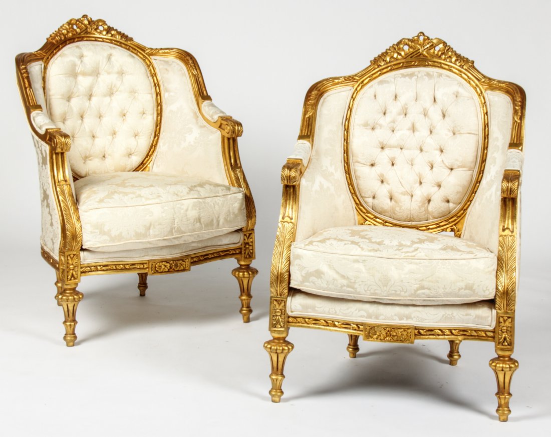 Pair Napoleon III Bergeres: Pair Napoleon III Bergeres. Parcel gilt frames upholstered in damask satin. Size: 44" x 29" x 29" (112 x 74 x 74 cm).