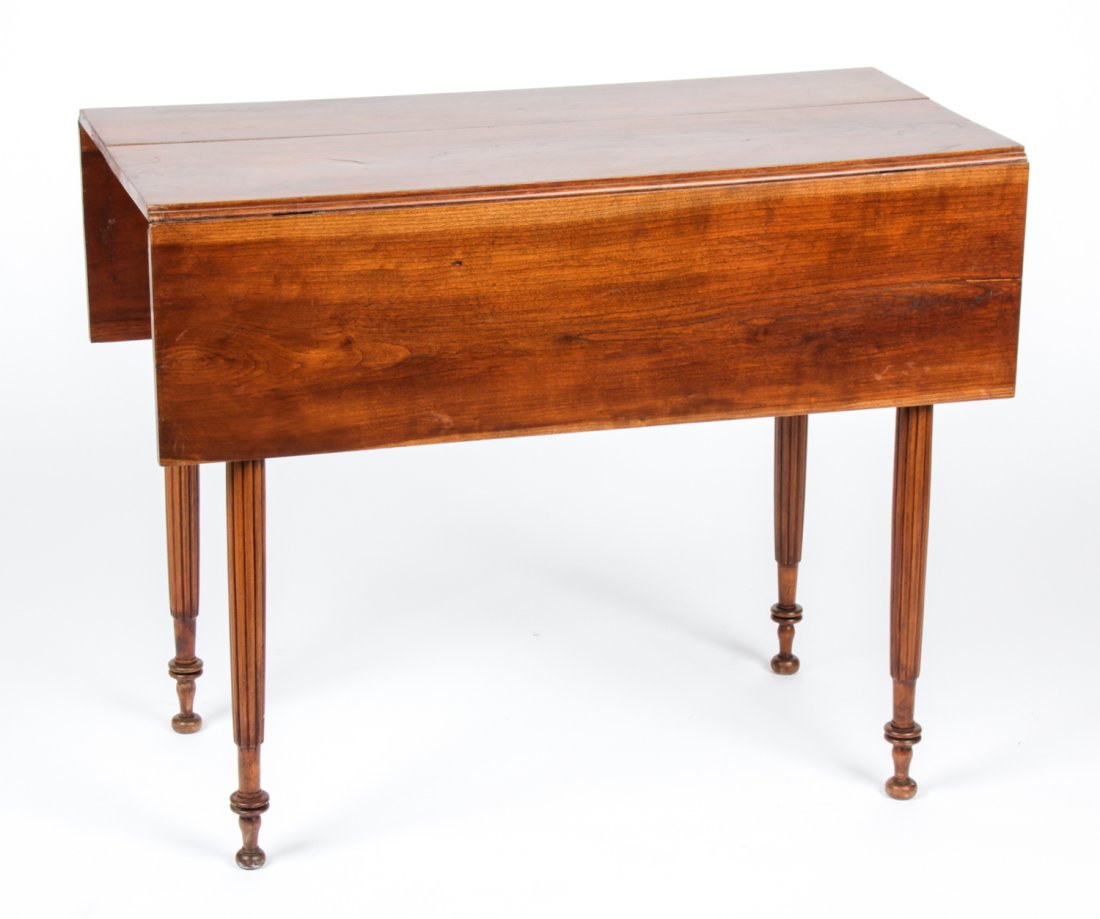 Antique Drop Leaf Farm Table: Antique Drop Leaf Farm Table. Size: 28.75" x 36" x 18", 73 x 91 x 46 cm (closed); 28.75" x 36" x 36.5", 73 x 91 x 93 cm (open). Provenance: Estate of Eileen Ford, Tewksbury, New Jersey.