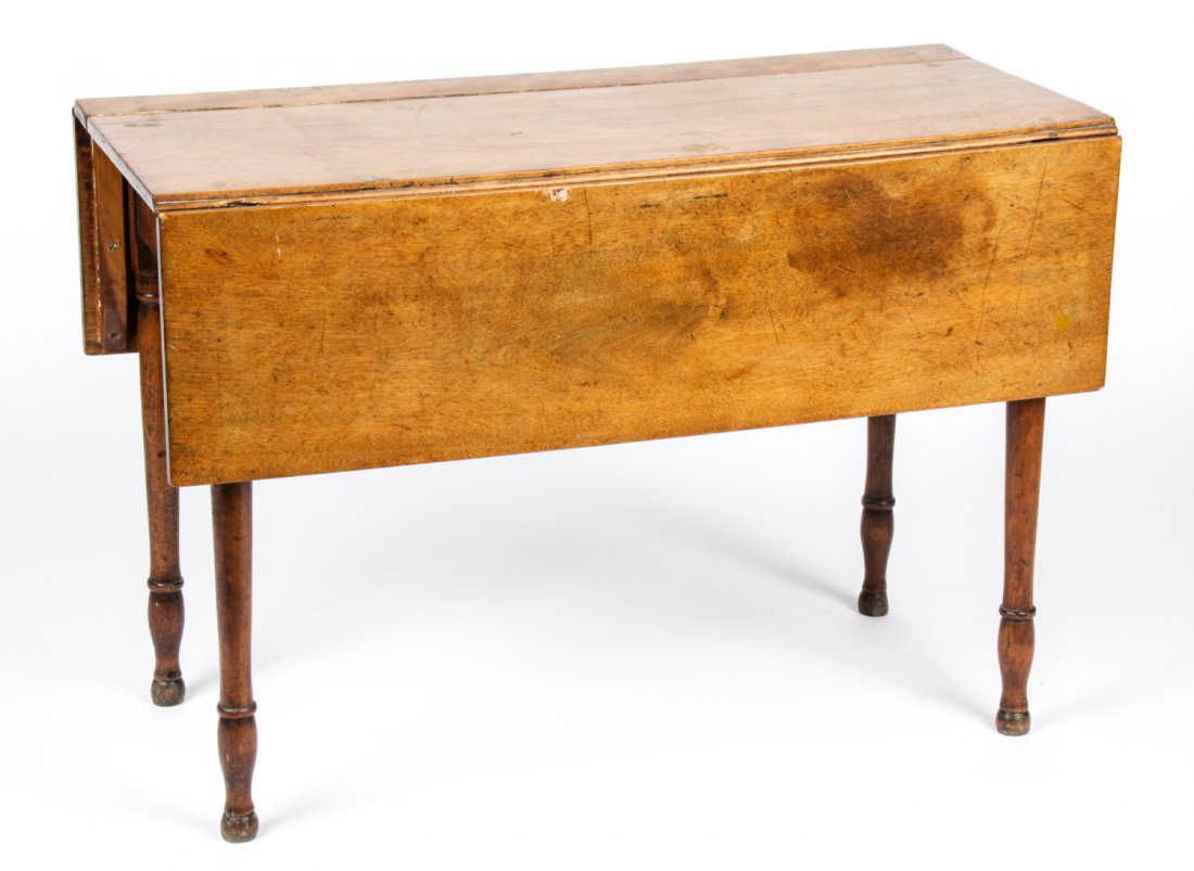 Antique Drop Leaf Farm Table: Antique Drop Leaf Farm Table. Size: 29" x 42" x 19.25", 74 x 107 x 49 cm (closed); 29" x 42" x 40.25", 74 x 107 x 102 cm (open). Provenance: Estate of Eileen Ford, Tewksbury, New Jersey.