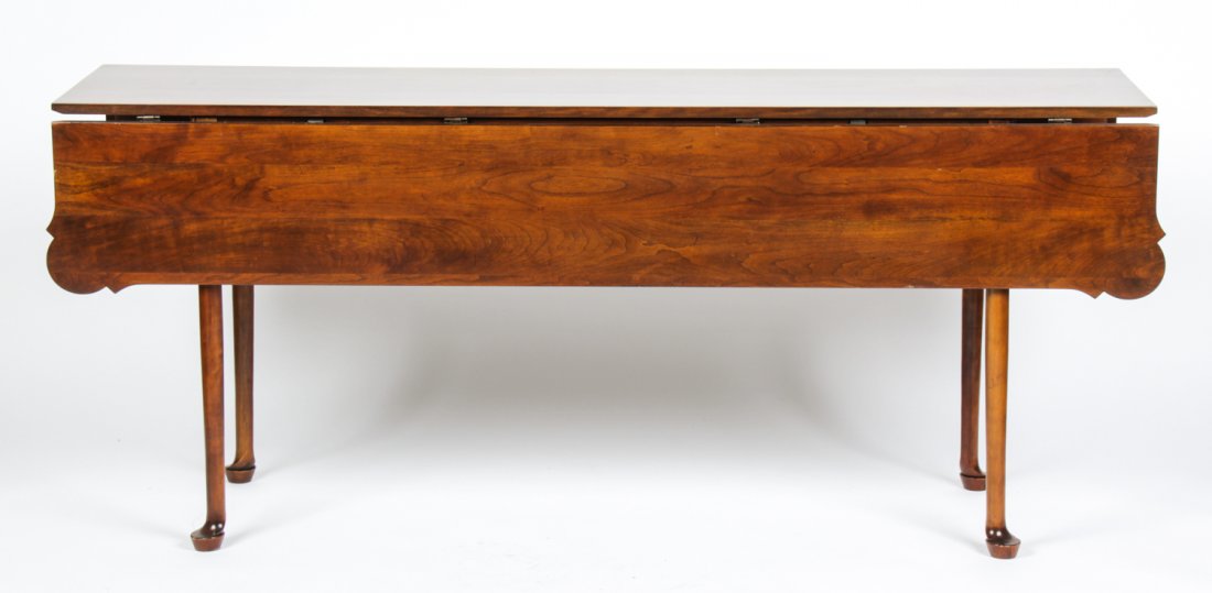 Queen Anne Style Drop Leaf Dining Table: Queen Anne Style Drop Leaf Dining Table. Size: 30" x 70.75" x 20", 76 x 180 x 51 cm (closed); 30" x 72" x 41.5", 76 x 183 x 105 cm (open). Provenance: Estate of Eileen Ford, Tewksbury, New Jersey.