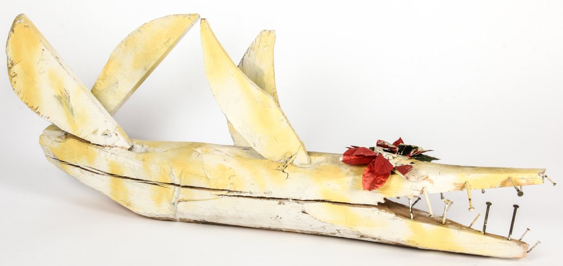 Clyde Jones (American/North Carolina, b. 1938 or '39): Clyde Jones (American/North Carolina, 20th c.) Critter Sculpture, 1999, mixed media, wood nails, found synthetic flowers. Size: 11.5" x 34" x 9.5" (29 x 86 x 24 cm). Provenance: Robert Lewis.